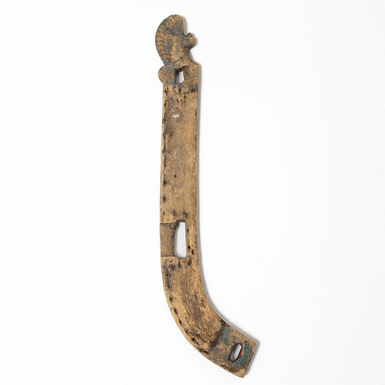A Swedish carved and painted horse harness part, 18th century.