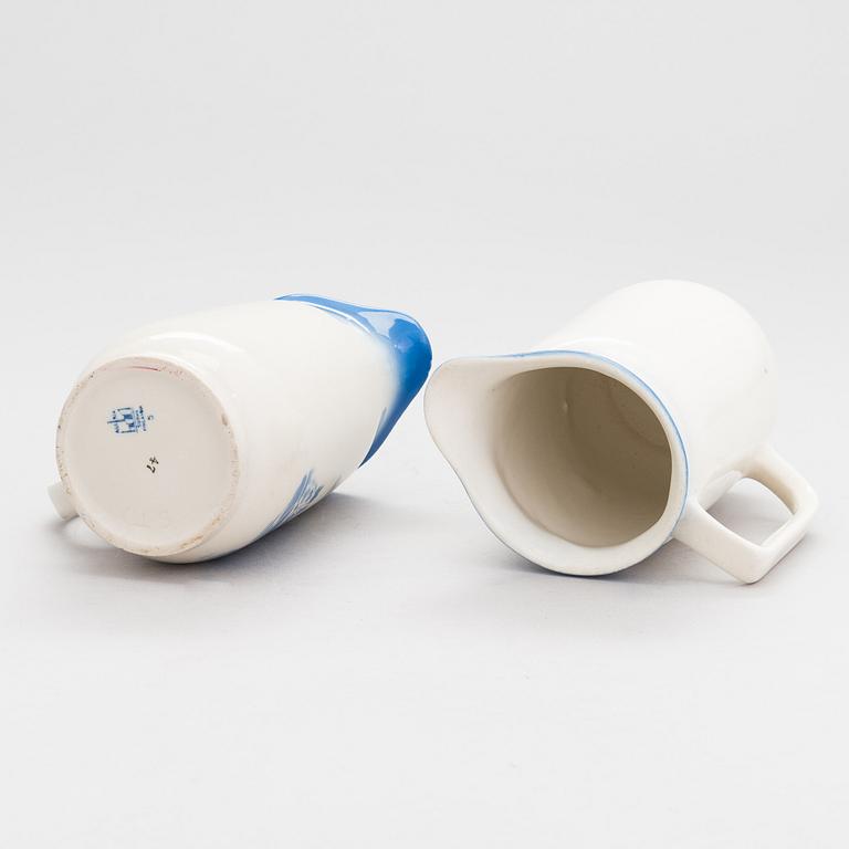 A set of six ceramic milk jugs by Arabia, Finland 1930s-40s.