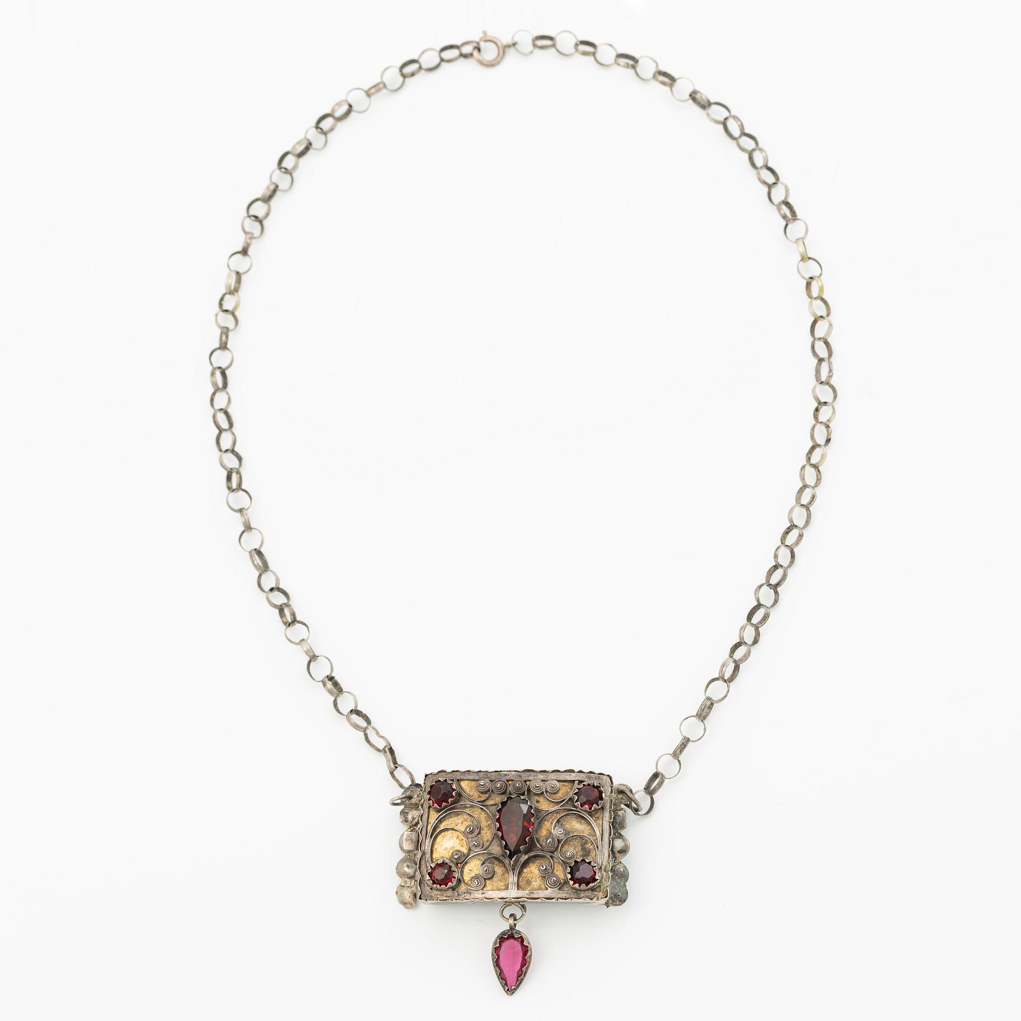 Costume jewellery, silver with glass stones.