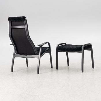 Yngve Ekström, a  'Lamino' easy chair with foot stool, Swedese, 2018.