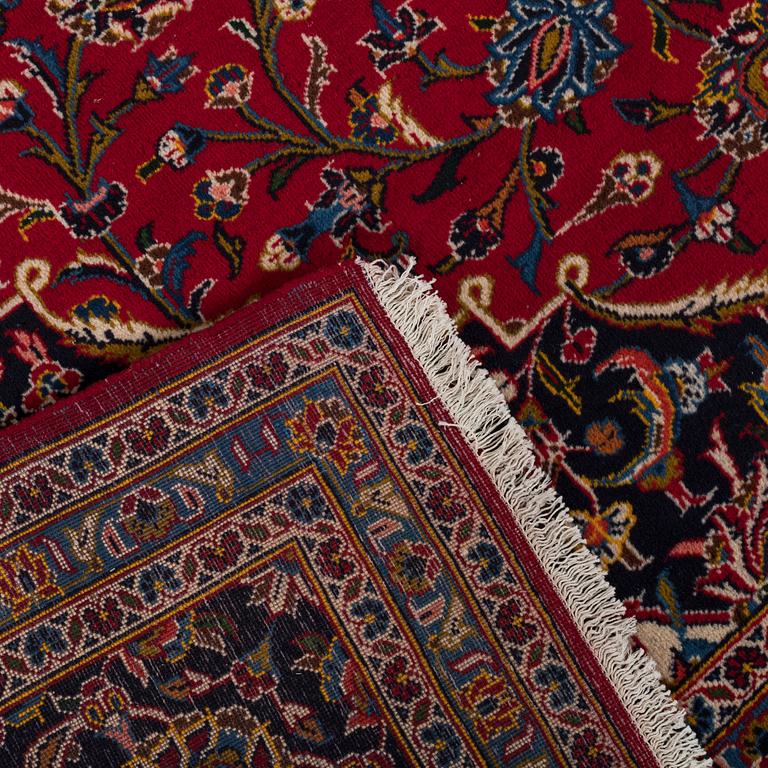 An old Keshan carpet ca 409 x 308 cm.
