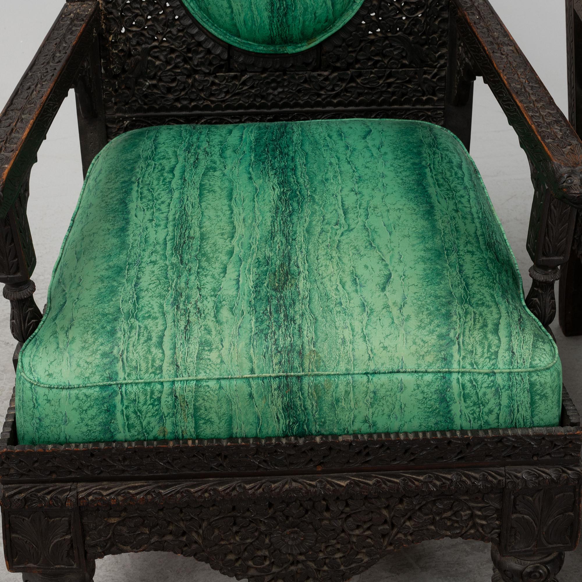 A pair of Angloindian carved chairs, India, 19th century, in so called 'Bombay style'.