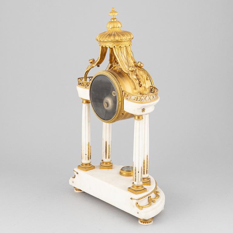 A Louis XVI marble and gilt bronze mantel clock, late 18th Century.