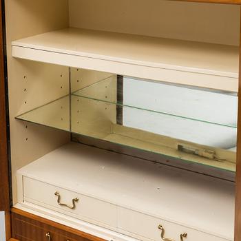 A mid 20th Century bar cabinet.