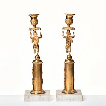A pair of late Gustavian candlesticks.