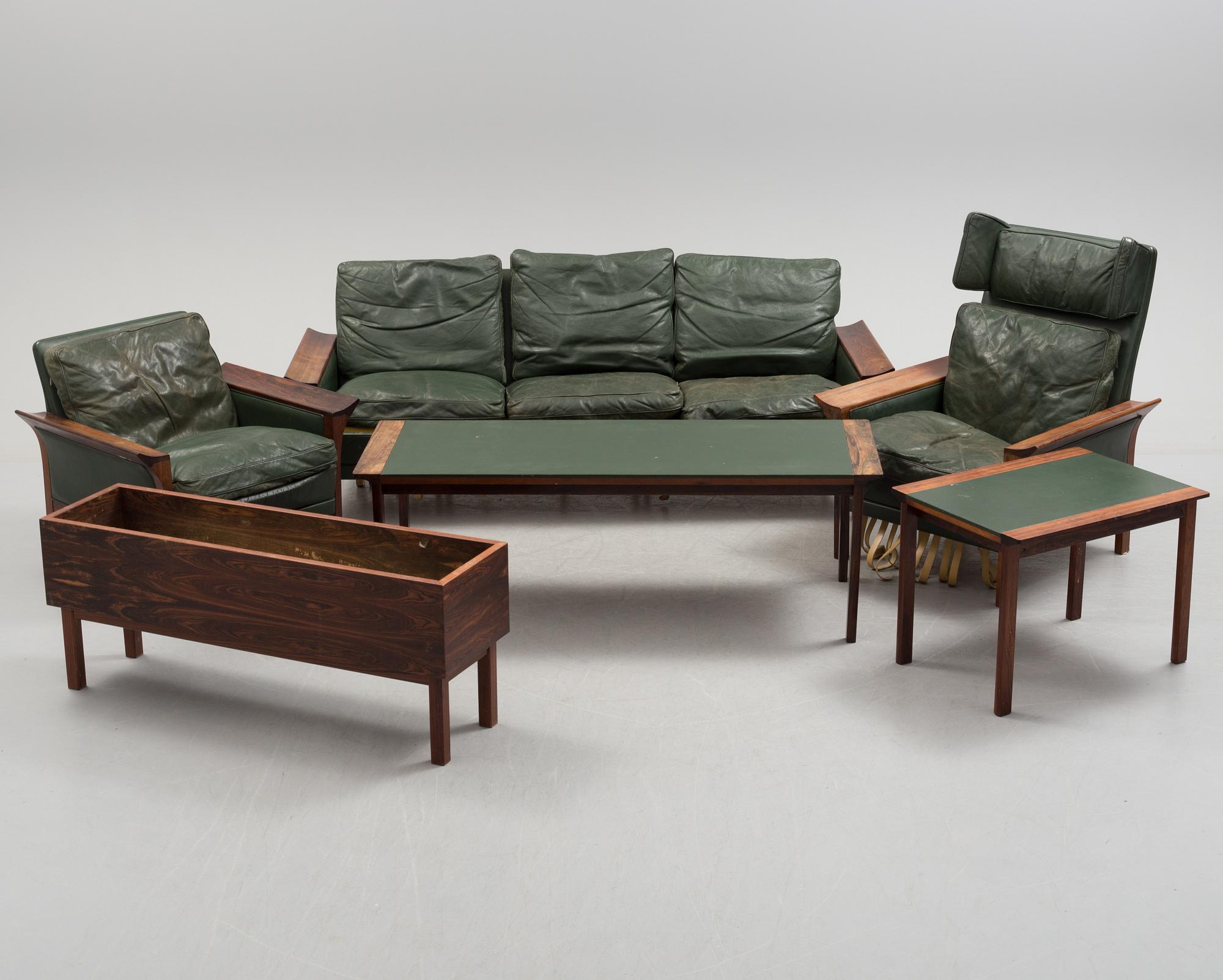 A 1960's Danish sofa, with 2 easy chairs and 2 tables by Glostrup.