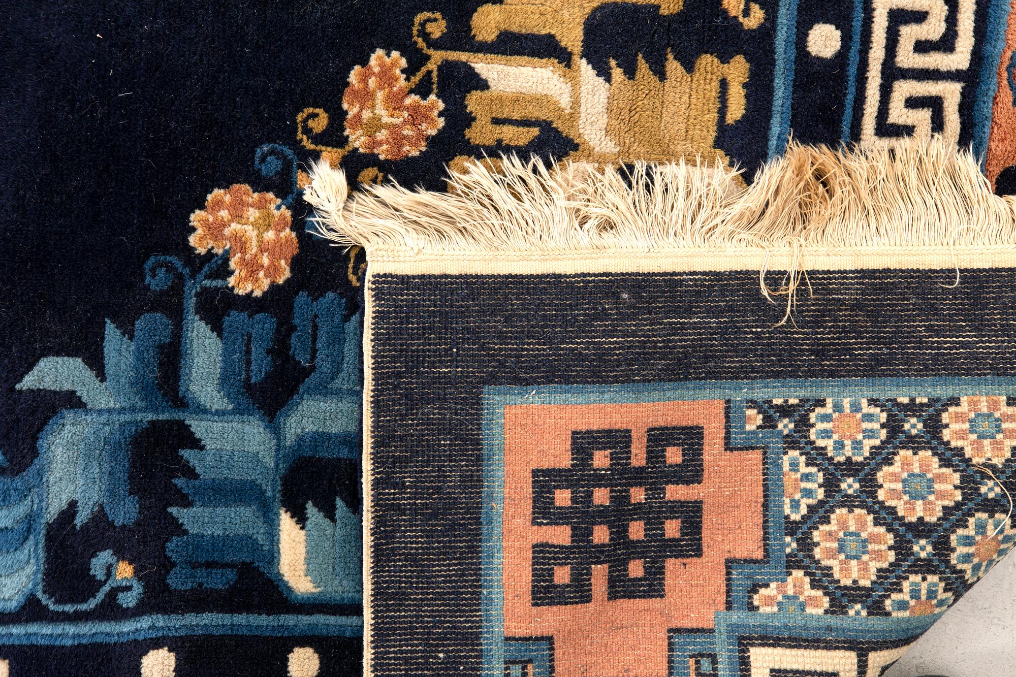 An old China carpet ca 274x183 cm.