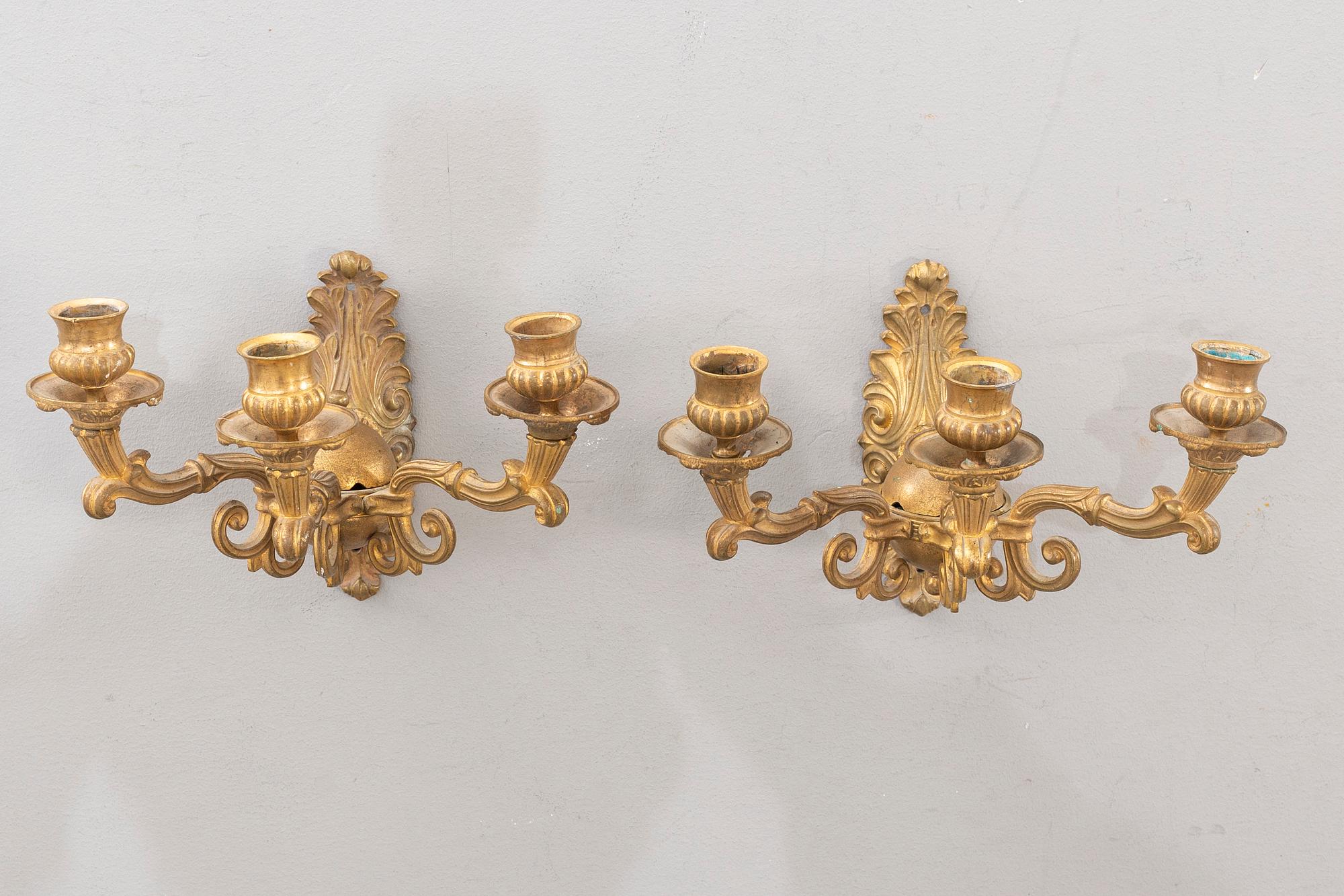 A pair of wall brackets late empire later part of the 19th century.