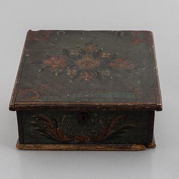 A Swedish polychrome-painted writing box, dated 1788.