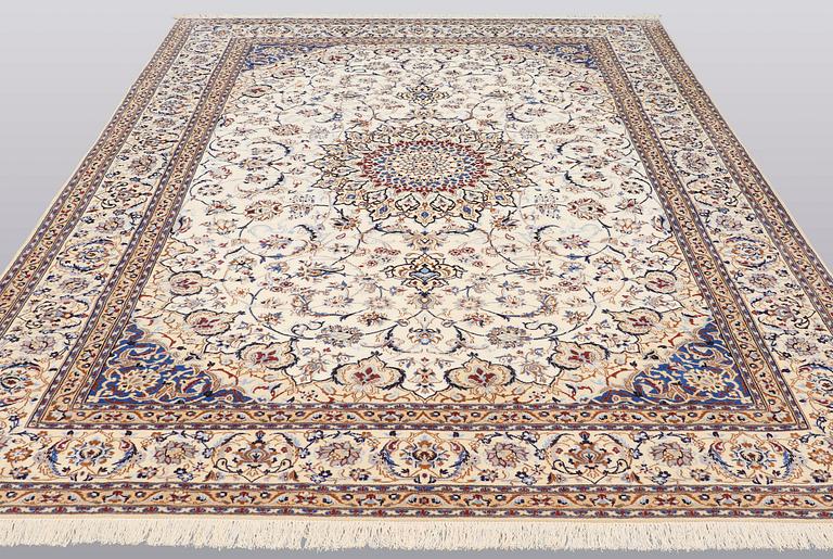 A carpet, Nain part silk, 361 x 262 cm.