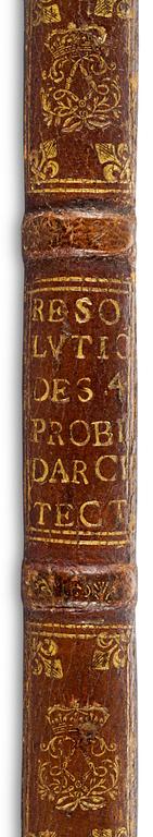 A Louis XIV leather-bound book cover.