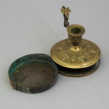 A BRASS NIGHT LIGHT HOLDER, first half of the 19th century.