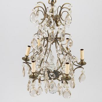A rococo style chandelier, early 20th century.