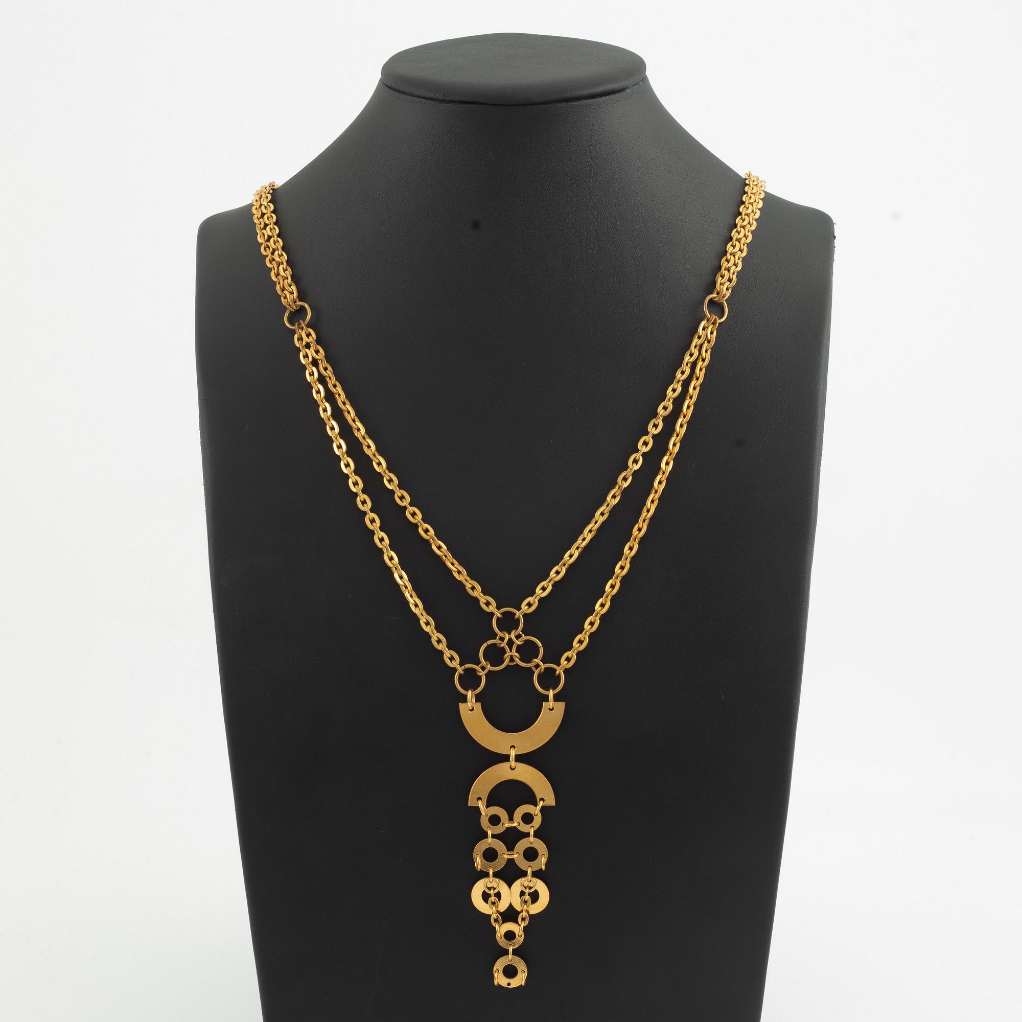 Siv Lagerström, two necklaces and one earring, gold-coloured metal.