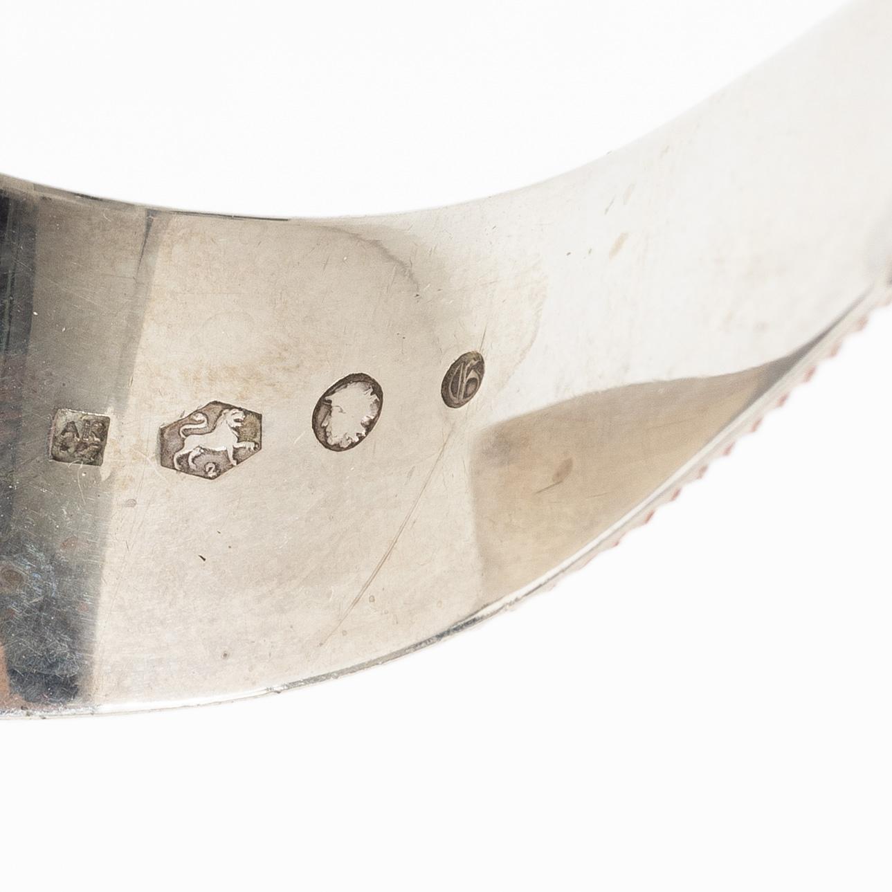 Four silver objects, 20th Century.