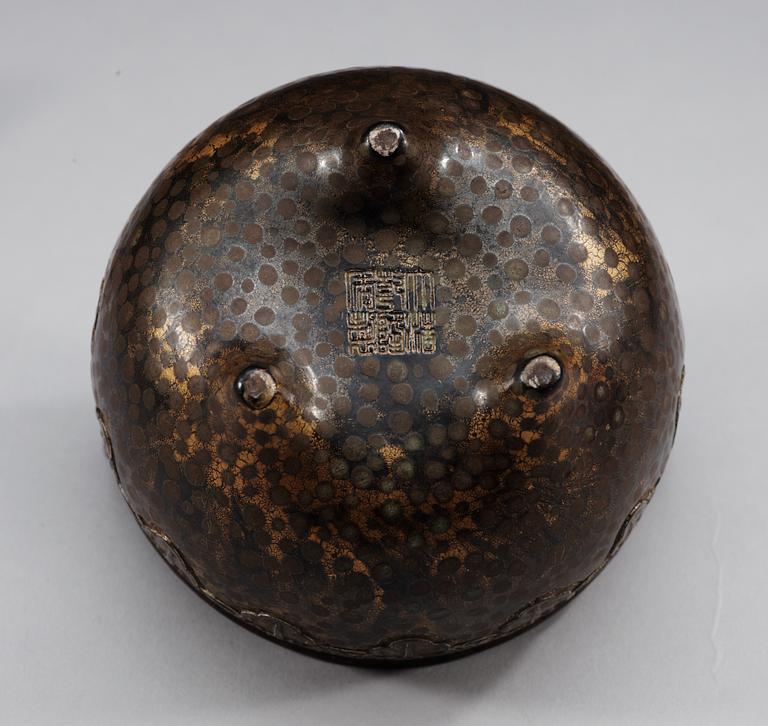 A bronze imitating porcelain tripod censer, presumably late Qing dynasty with Qianlong seal mark.