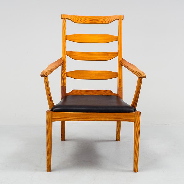 A "Vapensmeden" pine armchair by Carl Malmsten.