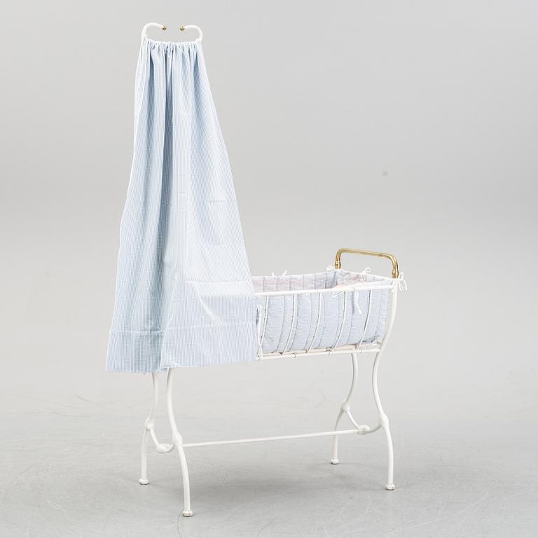 A children's or toddler's crib, the first half of the 20th century.