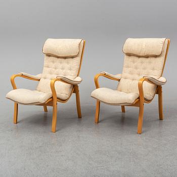 GUSTAV AXEL BERG, a pair of 'Peter' easy chairs, Bröderna Andersson.