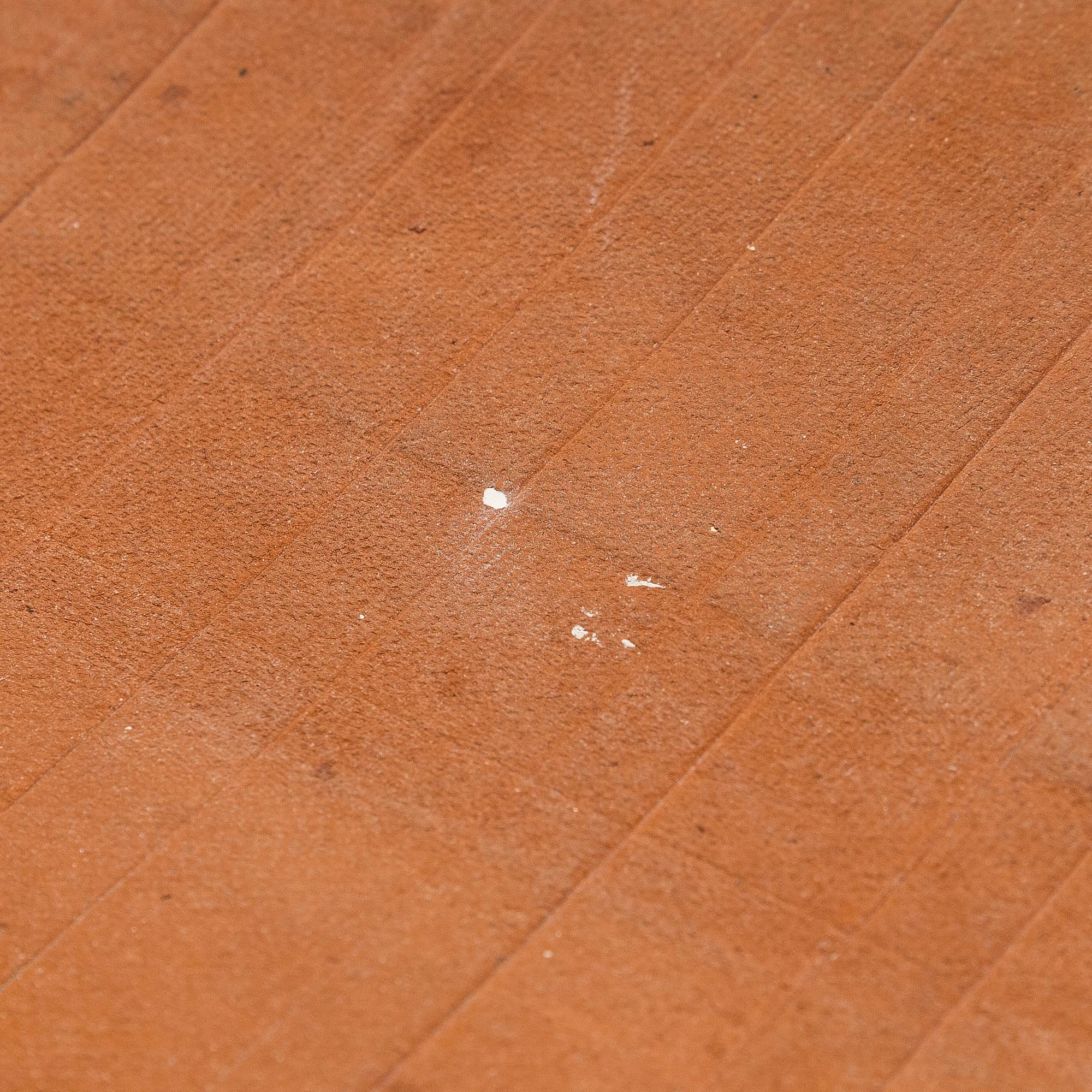 Kyllikki Salmenhaara, a 'winding' red clay sculpture, signed KS.