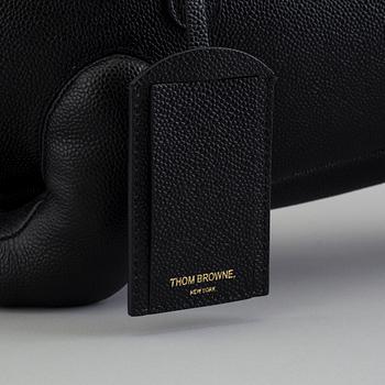 A "Hector Bag" by Thom Browne.