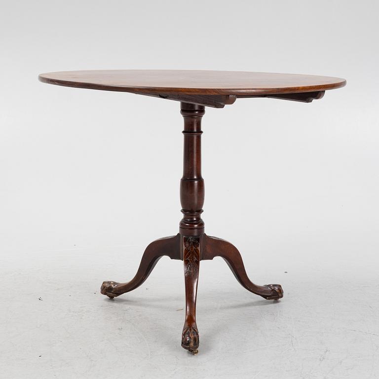 An English mahogany table, second half of the 19th Century.