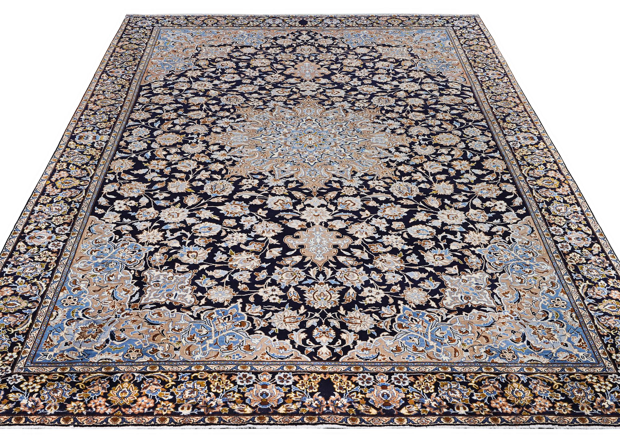 A Kashan carpet, c. 430 x 293 cm.