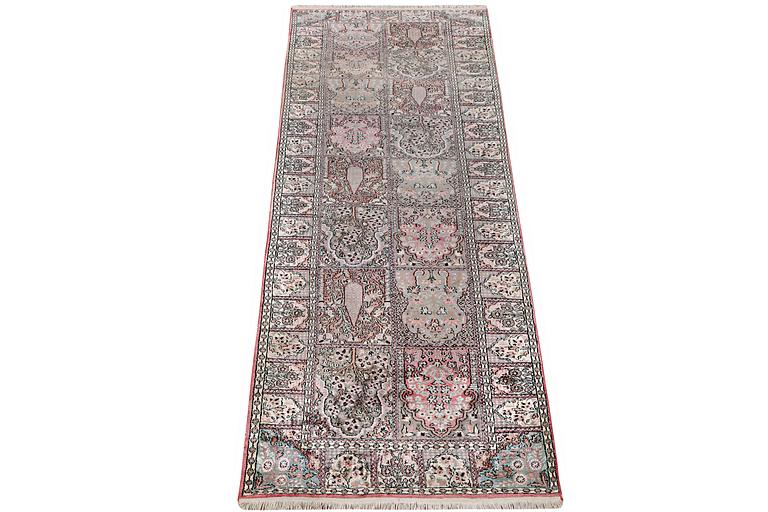 A Kashmir runner carpet, silk, c. 364 x 97 cm.