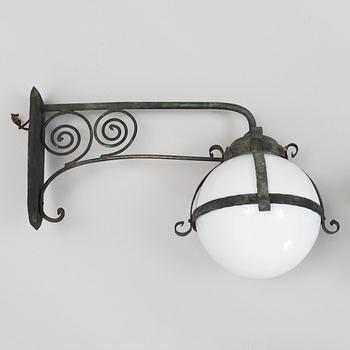 A pair of 1920's copper and glass outdoors wall lights.