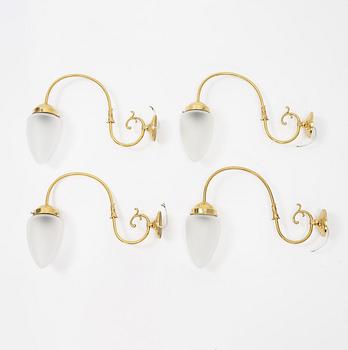 Four brass wall lights, second half of the 20th Century.