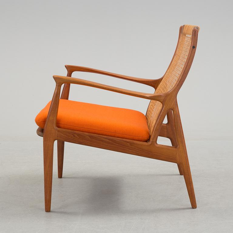 S A ANDERSEN, ERIK ANDERSEN & PALLE PEDERSEN, a teak and rattan easy chair from Horsnaes, Horsens, Denmark, 1960's.