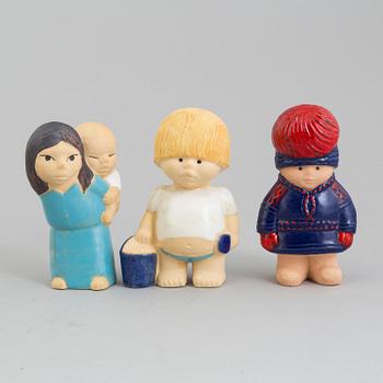 A collection of six stonewear figurines from the series "All världens barn" by Lisa Larson for Gustavsberg.