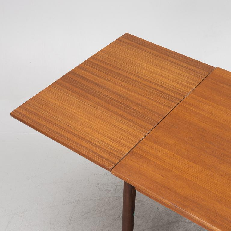 A dining table, 1950s/60s.