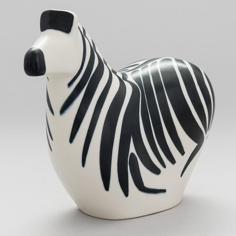 A STONEWARE FIGURINE by LILLEMOR MANNERHEIM, signed Lillemor Arabia -85.