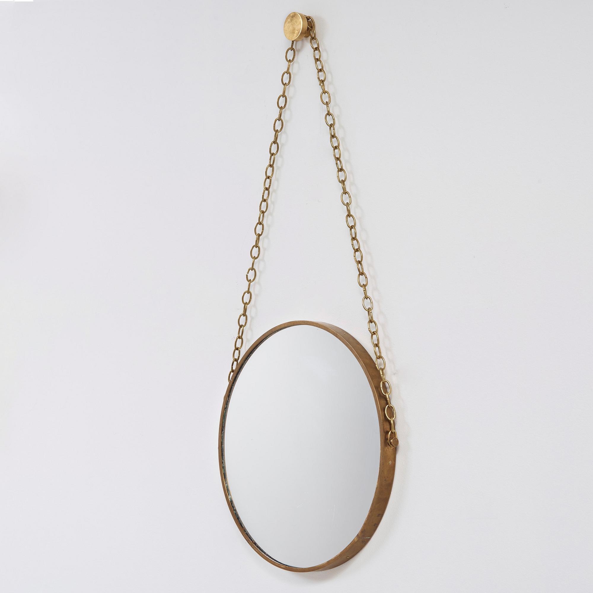 A mid 20th Century brass mirror, 1950-60's.