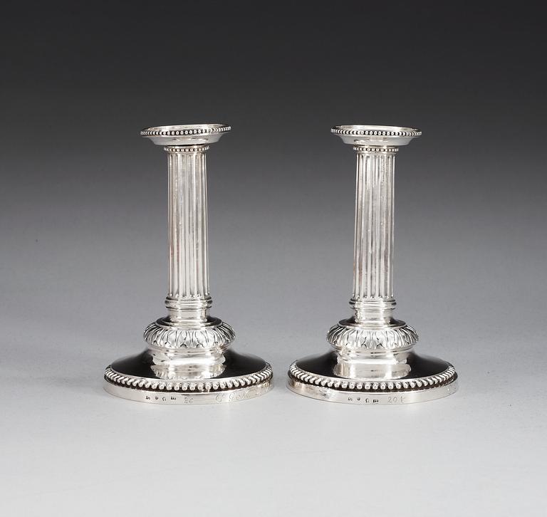 A pair of Swedish 18th century silver candelsticks, makers mark of Petter Eneroth, Stockholm 1786.
