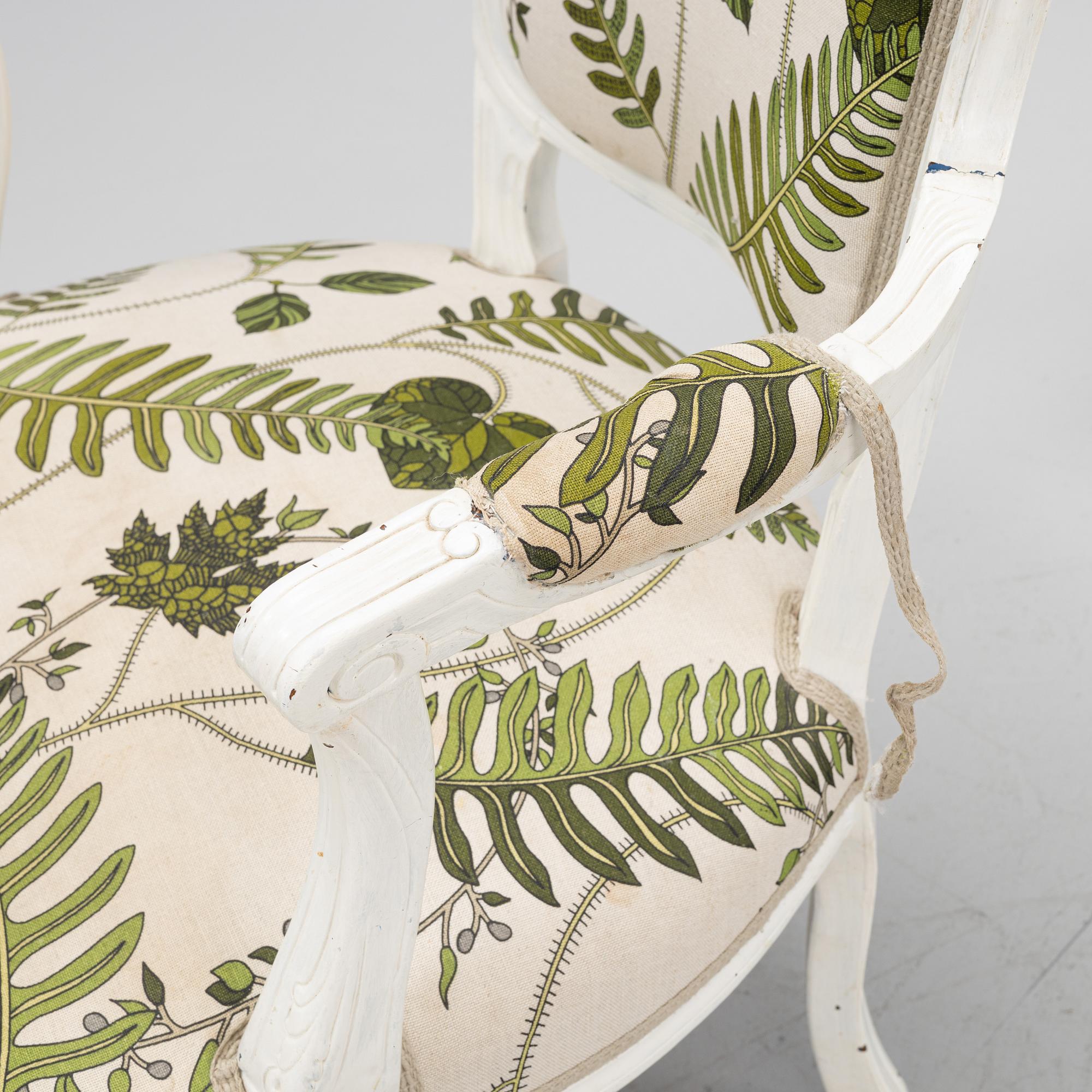 A pair of Rococo style armchairs, 20th century.
