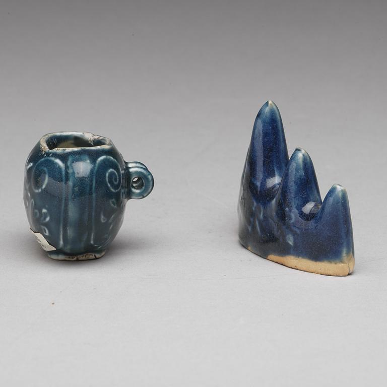 A blue glazed brush rest and a brush washer/birdcup, Qing dynasty (1644-1912).