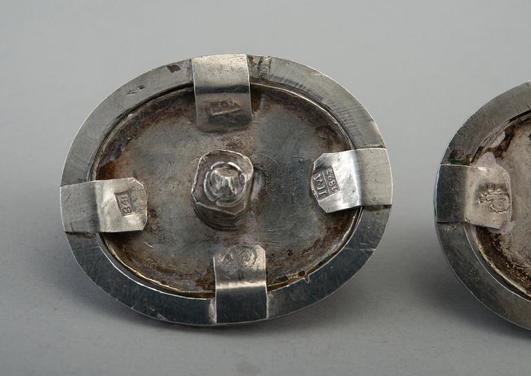 2 BADGES, gilt silver, niello. Moscow 1827. Master mark A.G. Measurements 34 x 41 mm. Weight 33,5 g.