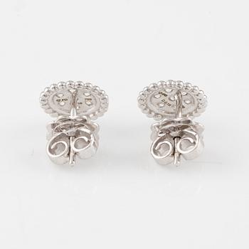 Earrings with brilliant-cut diamonds.