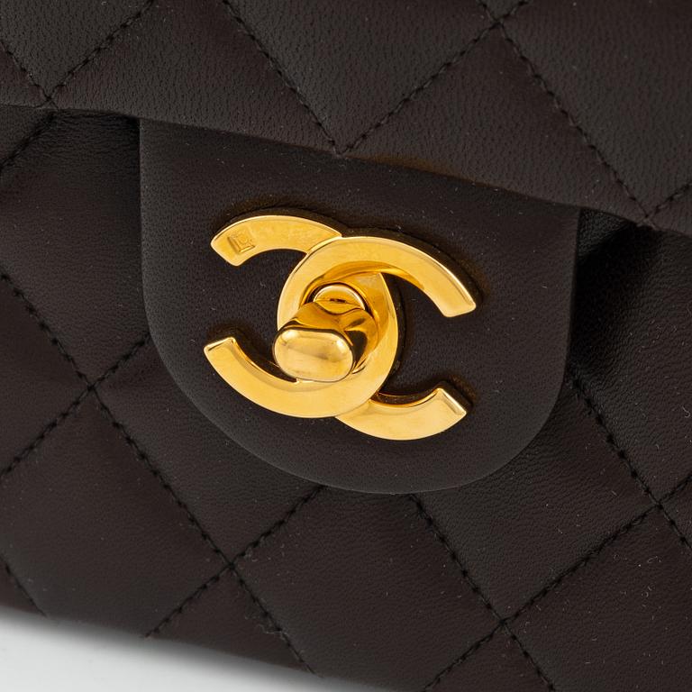 Chanel, A brown leather 'Mini Flap' bag, 1996-1997.