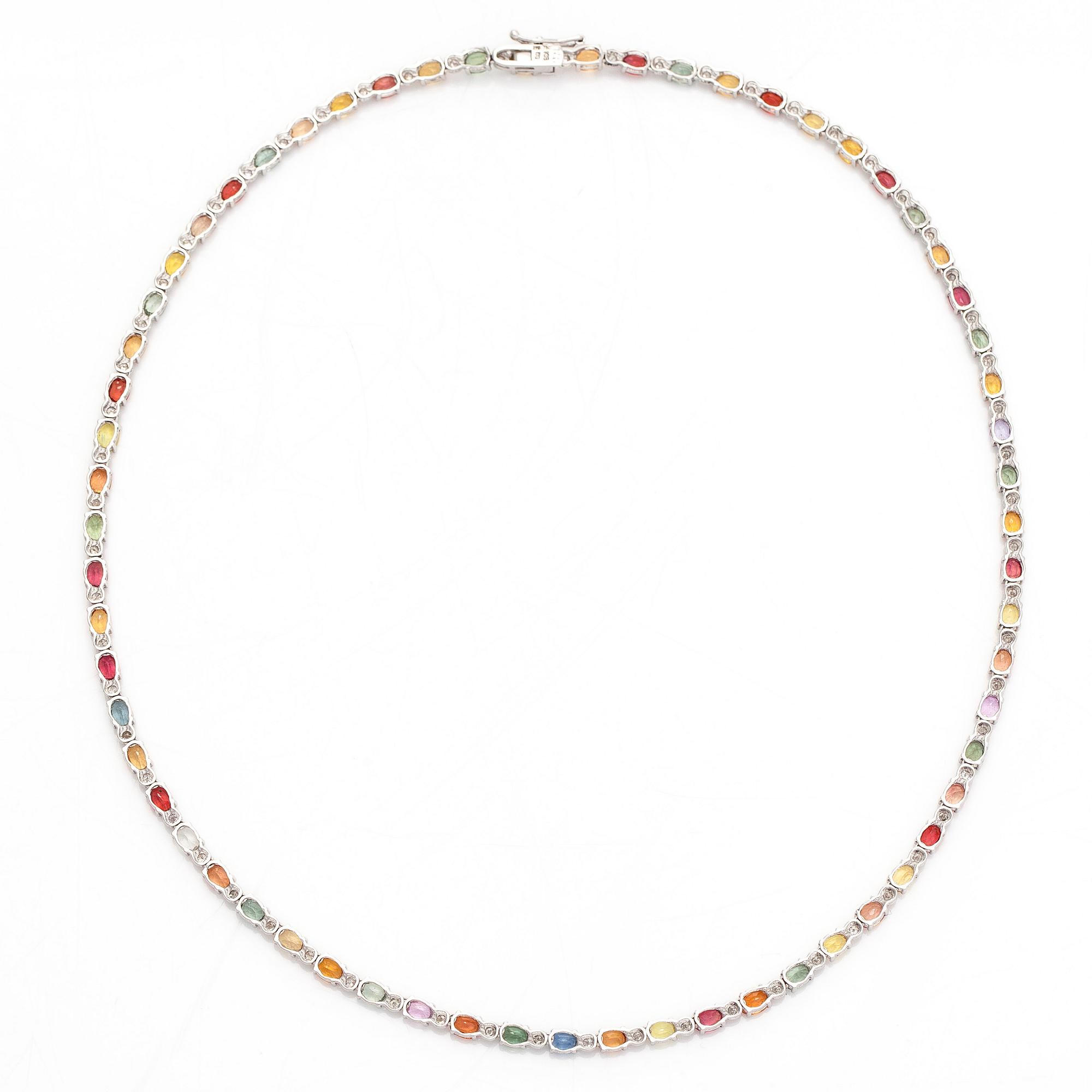 An 18K white gold necklace with multi-coloured sapphires and diamonds.