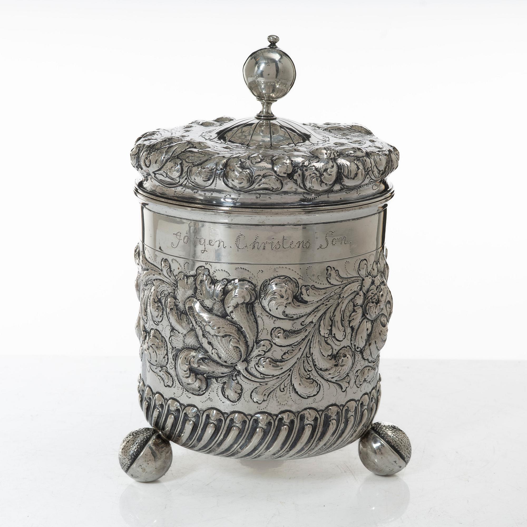 A 19th/20th century silver beaker and cover. Barock style.