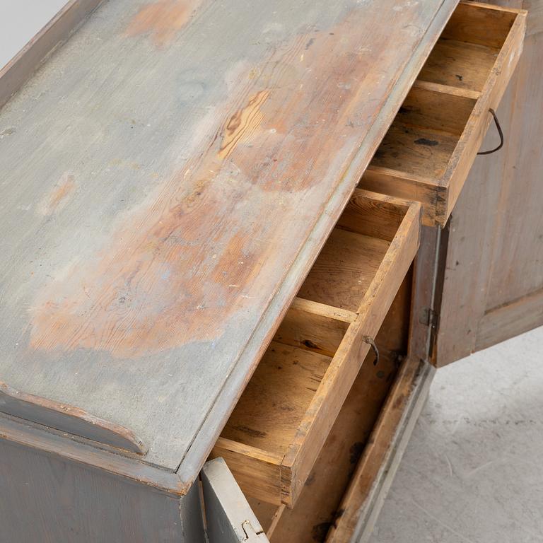 A Gustavian cupboard, circa 1800.