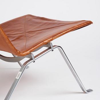 Poul Kjaerholm, a pair of brown leather 'PK22' chairs, edition E Kold Christensen, Denmark.