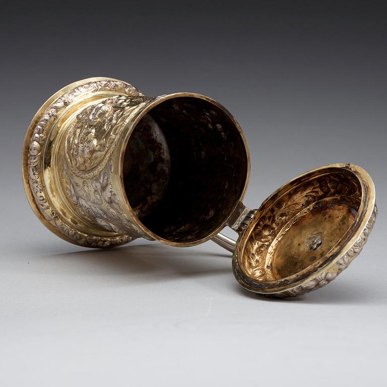 A German, probably Helmstedt late 17th century parcel-gilt tankard, unidentified makers mark.