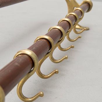 An early 20th century clothes rack.