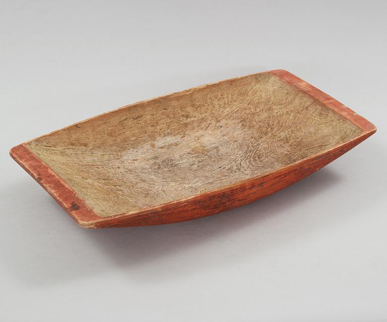 A wooden bowl from the 19th century.