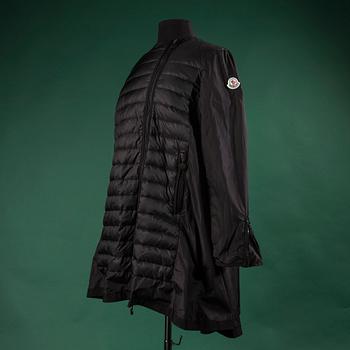 A jacket by MONCLEAR, size 3.