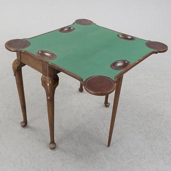 A mahogany games table, 18th Century.